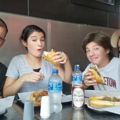 Fr. Augustine, JennaMarie, Giuseppe and Augie at Jim's steaks in south Philly!