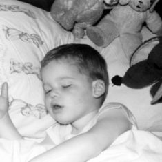 Young Stephen sleeps before taking on the world.