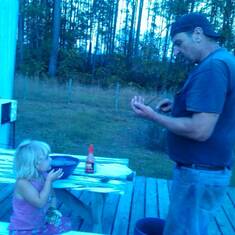 Gloria 2 yrs old eating oysters with her papa for the first time