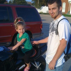 Brian and Abrianna. Brian's motorcycle.