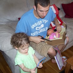 Daddy helping to open Dora doll Abrianna got from Gaga (me). Easter, 2009.