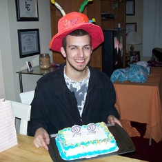 Steve's last birthday. 22 years old. The goofy orange hat with candles on top, that I forced them both to wear is now retired. Steve was the last one to wear it.