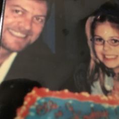 Daddy and daughter with her birthday cake.