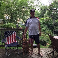 Steve and doggie Ridley on the fourth of July.