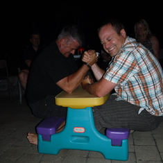 Arm wrestling at the big boy table