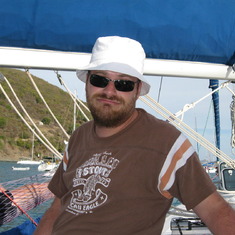 There's a story behind this one....on our sailing trip in the Virgin Islands, we voted every night on who had done the stupidest thing that day and the following day they had to wear the "Gilligan hat".  Here is one of Steve's turns wearing the hat.