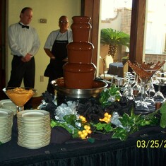 Steve loved working the chocolate fountains.  He looks very handsome