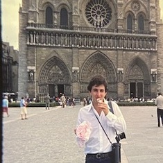 Enjoying French pastry in front of Notre Dame, Paris 1979