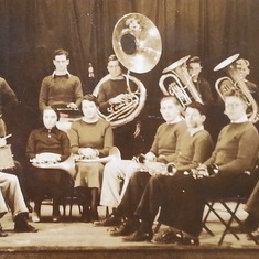 Drummer in high school band (left of middle)