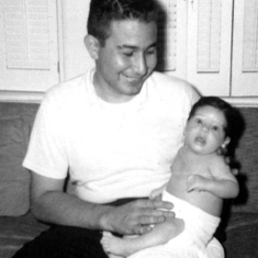 Stu in 1959 with Tom, his firstborn child.