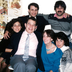 Stu with Sandy and their four children in 1990.