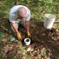 Sue Ann's brother in law, Jim Haskell, as he helps to bury half of her ashes in a BiosUrn on his property in the woods of Northern Michigan. Sue Ann loved walking in these woods. Someday, hopefully, this BiosUrn, which includes a seed, will grow into a pi