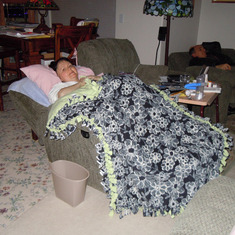 November 2010 - Sue Ann resting with the beautiful blanket niece Brenda made to keep Aunt Susie warm
