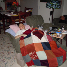 November 2010 - Sue Ann at her home in Anchorage with the beatufiul blanket nephew Michael made for her to help her heal after surgery