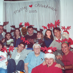 Hoefler Family Christmas photo - 2001, Sue Ann was not at home that year so we cut out her photo along with dad's photo and added them to the group shot. Sue Ann was taking care of the sick at Christmas