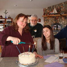 Sue Ann lights Candles on the cake she made for Niece Brenda's Birthday - Sue Ann, Mike, Brenda, Peg