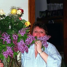 Sue Ann as beautiful as the flowers