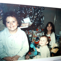 SueAnn with baby Danny , sister JoAnne Christmas