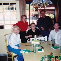 Sue; her mom, Rosa; her sister, Nell; her brothers, Mike and Don.