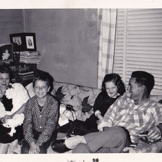 Caroline, Mike, Kitty, and Herman. Christmas Eve 1955