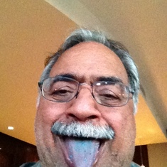 Surinder enjoyed his piece of BLUE cake from Rochelle