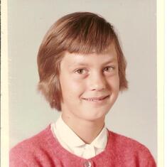 Sue as a young school girl