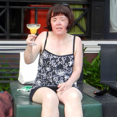 2011 Cambodia - Mango cocktails by the pool. Cheers Sue!