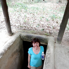 2011 Vietnam - Sue about to crawl through he underground Cu Chi tunnels! 