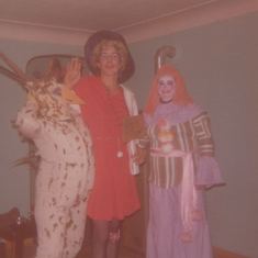 Grandma Thelma as a chicken, neighbour as a lady, and Mom as a clown. 