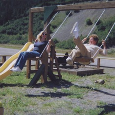 Mom and I swinging in Deer Lake.