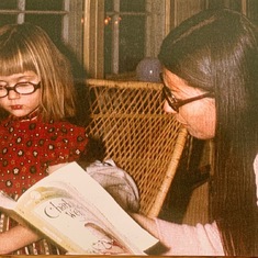 Susan reading Charlotte's Web to four-year-old Alisa
