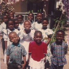 Mambei in the back left corner at my first Holy Communion party. June 1995