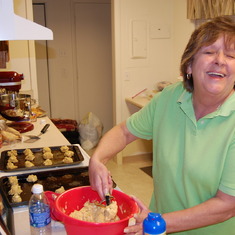 Mom helping Melanie bake cookies in Washington
