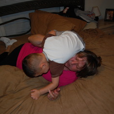 Jordan wrestling with his Gee-Gee Sue!
