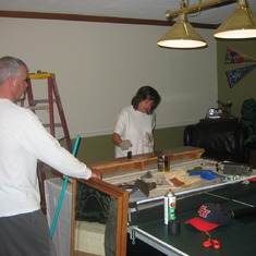 Mom doing her thing with refinishing furniture - she knew a lot about refinishing furniture!