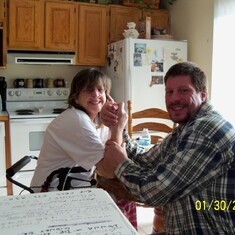 Mom and Steve arm wrestling