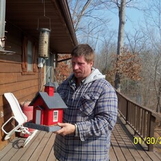 Steve filling the bird feeders
