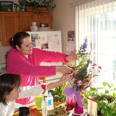 Tammy and Sue cutting flowers