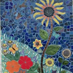 Susan's classmates in the decorative arts each created a ceramic piece towards the creation of this mosaic  in memory of Susan. The mosaic is a beautiful piece of public art located at the corner of Chapman and Knott in Garden Grove.