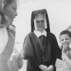 In the playground of Corpus Christi with Sister Mary Fridolin (I think).