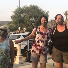 The sisters matchy-match masks as they shop