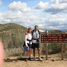 Susan and Rajeev hiking Iron Mountain