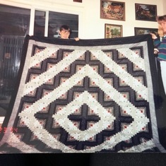 Mom with Susan and the first big quilt mom made for Susan