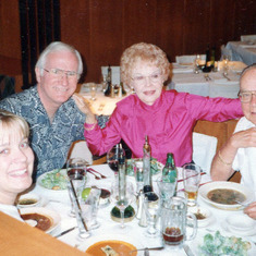 Sue and Zach celebrating Thanksgiving with Julie Kassie, Ray, and Jaron. in 1999.