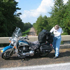 Suzanne and her 2001 HD Softail somewhere in Missippi I think.