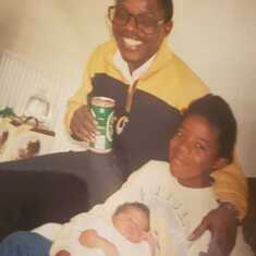 My sweet uncle sly, sister Joanne and me as a baby 