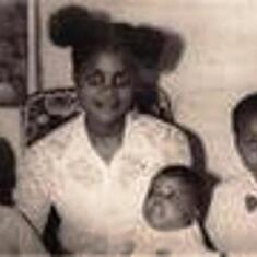 1973 December: Mummy'm: Sylvia Wachuku with her 3 boys: r: Ugonna. l: Uchenna: c: Ikenna.