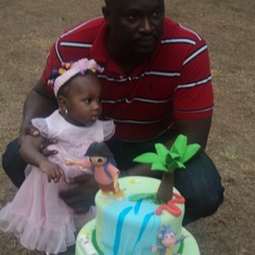 Chisom with dad on 1st Bday 1