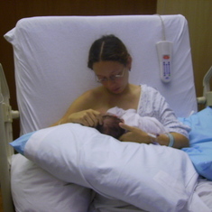 her first breastfeeding with mommy