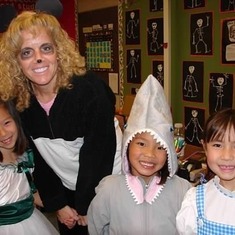Ms. Schilling loving Halloween with Grace, Madison & Holly.